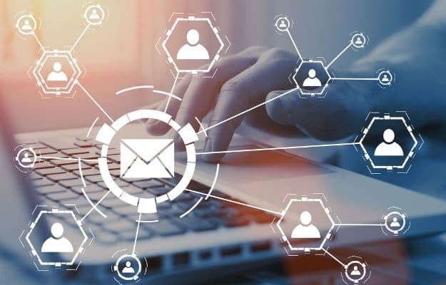 a men is typing laptop and vectors of email connecting people ss